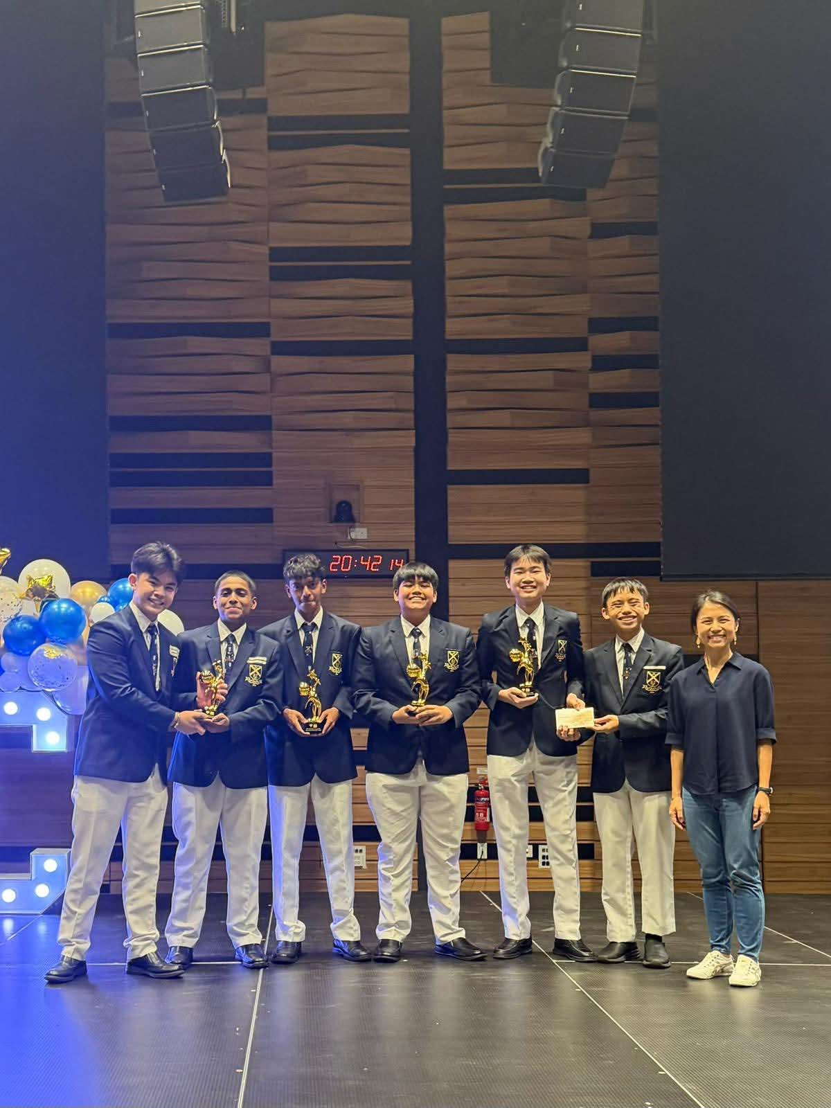 Linus with the prefectorial board and a trophy